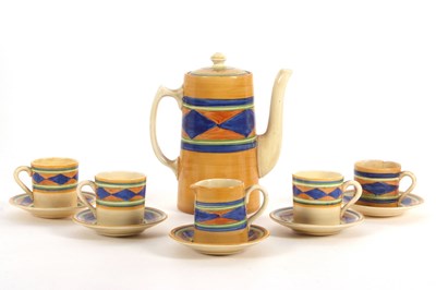 Lot 41 - A Clarice Cliff part coffee set in an early...