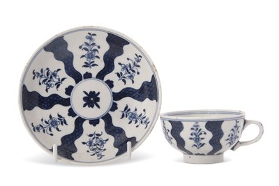 Lot 60 - A Lowestoft porcelain teacup and saucer in the...