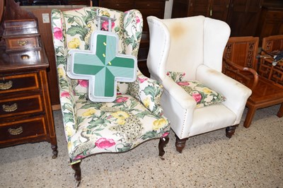 Lot 279 - Two late 19th Century wing back armchairs for...