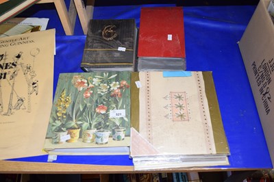 Lot 521 - Four albums of assorted postcards and first...
