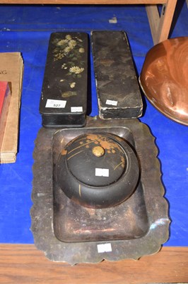 Lot 527 - Two chinoiserie papier mache glove boxes...