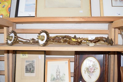 Lot 551 - A pair of single branch wall mounted brass...