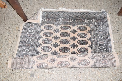 Lot 310 - A 20th Century patterned floor rug