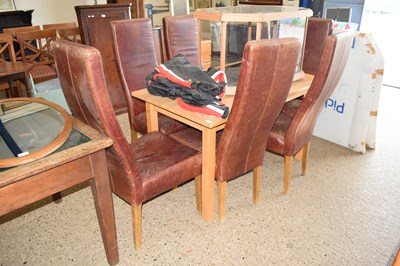 Lot 311 - Modern dining table and six leather...