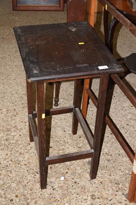 Lot 317 - A dark oak lamp table, towel horse and LLoyd...