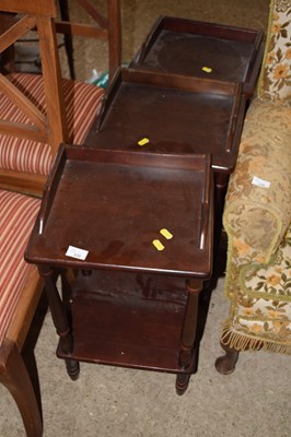Lot 335 - Three dark wood finish bedside cabinets