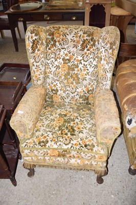 Lot 336 - A wing back chair