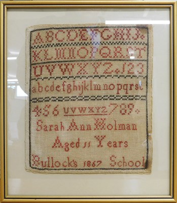 Lot 193 - A Victorian needlework sampler, with alphabet...