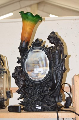 Lot 633 - An Art Nouveau inspired table lamp mirror