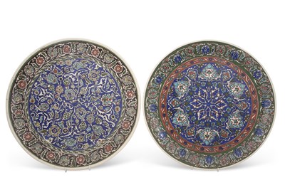 Lot 99 - A pair of Persian pottery plaques decorated in...