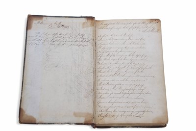 Lot 106 - An early 19th Century book with leather spine...