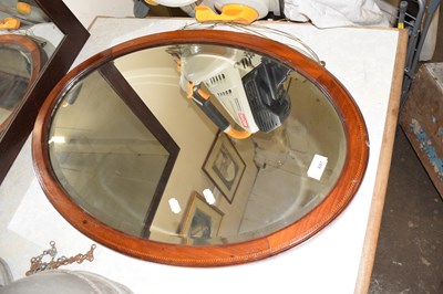 Lot 697 - Mahogany framed oval mirror with inlaid...