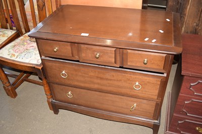 Lot 731 - A darkwood finish chest of drawers