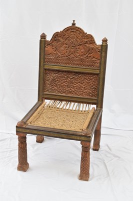 Lot 241 - Indian hardwood chair with heavily carved back...