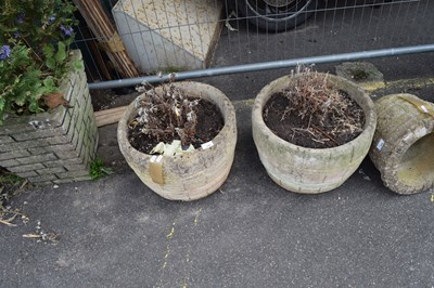 Lot 395 - Two round composite garden planters