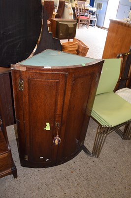 Lot 267 - 19th Century bow front mahogany corner cupboard