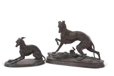 Lot 300 - A small hollow bronze model of a greyhound...