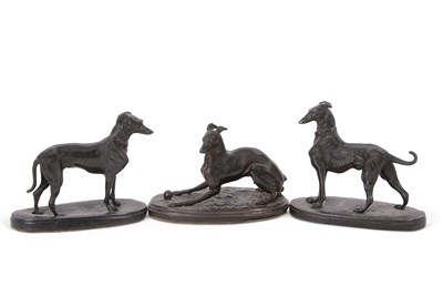 Lot 302 - A group of three small bronze models of...