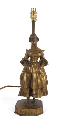 Lot 312 - A 20th Century polished bronze table lamp, the...