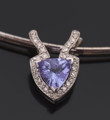 Lot 270 - A tanzanite and diamond pendant necklace, the...