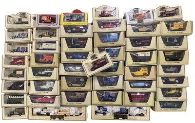 Lot 303 - A collection of various boxed die-cast cars,...