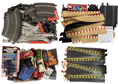Lot 524 - Four large boxes of Scalextric cars, track, etc