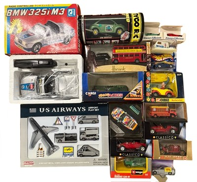 Lot 307 - A mixed lot of various boxed die-cast cars to...