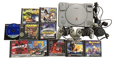 Lot 532 - A Sony PlayStation console, 2 controllers, 2...