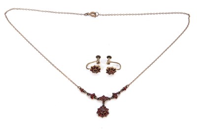Lot 142 - A garnet necklace and earrings, the necklace...