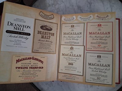 Lot 279 - Four albums of whisky labels, two albums of...