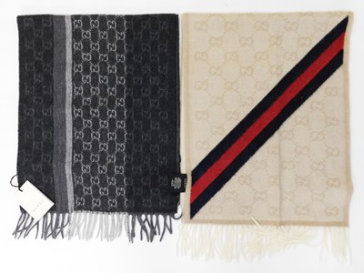 Lot 138 - Two Gucci scarves: to include a Gucci a grey...