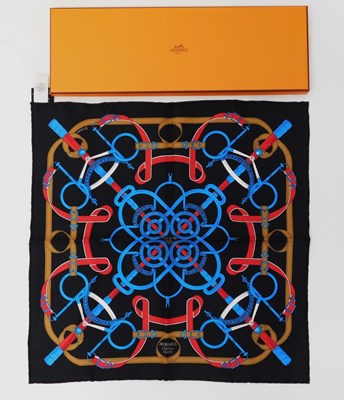 Lot 136 - An Hermes Gavroche Eperon silk scarf, in black,...