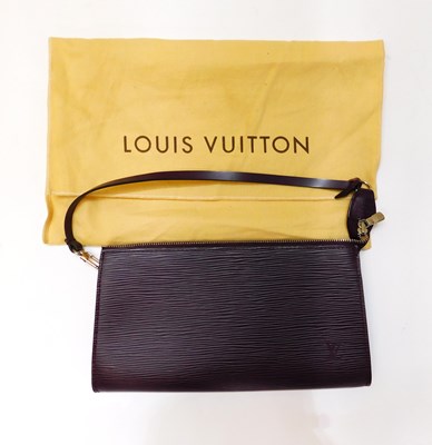Lot 133 - A Louis Vuitton Epi pochette, in aubergine...