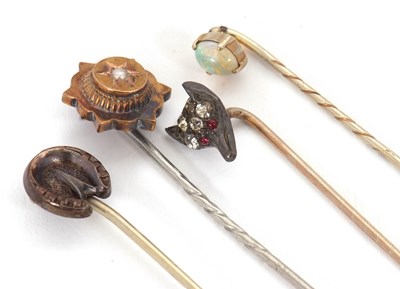 Lot 85 - Four stick pins: to include a fox head pin set...