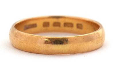 Lot 225 - A 22ct wedding band, 4mm wide, hallmarked...