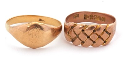 Lot 209 - Two gold rings: to include a 9ct plaited style...