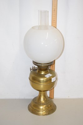 Lot 39 - A brass based oil lamp