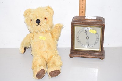 Lot 98 - An Elliott mantel clock and a vintage teddy bear
