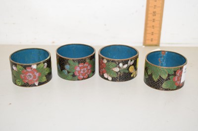 Lot 130 - A set of four cloisonne napkin rings