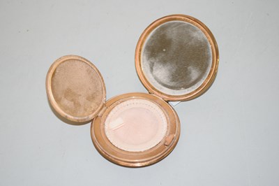 Lot 134 - A gold plated powder compact with RAF Wings...