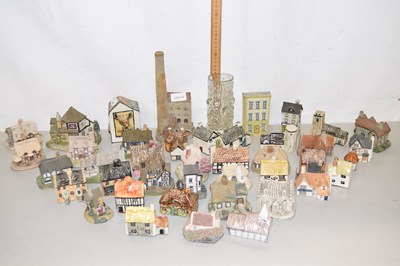 Lot 139 - A collection of various model cottages to...