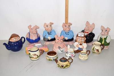 Lot 163 - A group lot of Wade Nat West piggy banks,...