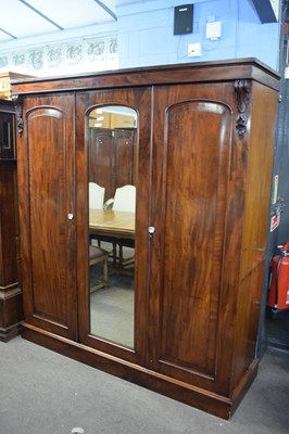 Lot 250 - Victorian mahogany wardrobe with triple doors,...
