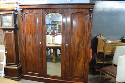 Lot 250 - Victorian mahogany wardrobe with triple doors,...