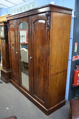 Lot 250 - Victorian mahogany wardrobe with triple doors,...