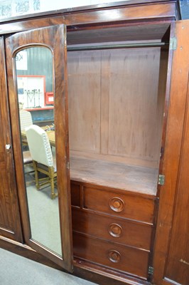 Lot 250 - Victorian mahogany wardrobe with triple doors,...