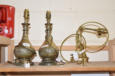 Lot 524 - Three brass table lamps