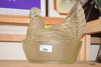 Lot 545 - A glass chicken storage jar