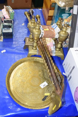 Lot 620 - Quantity of brass fire irons, fire dogs and a...