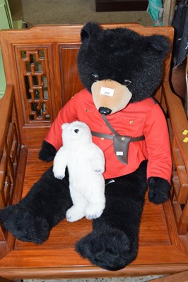 Lot 297 - A large teddy bear and another smaller